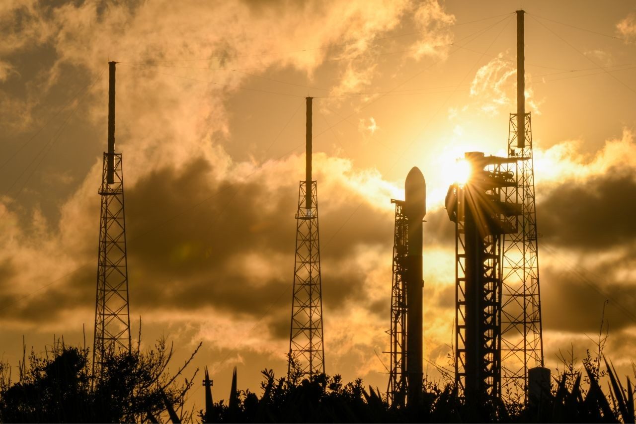GPS III SV09 on launch pad at sunset.
